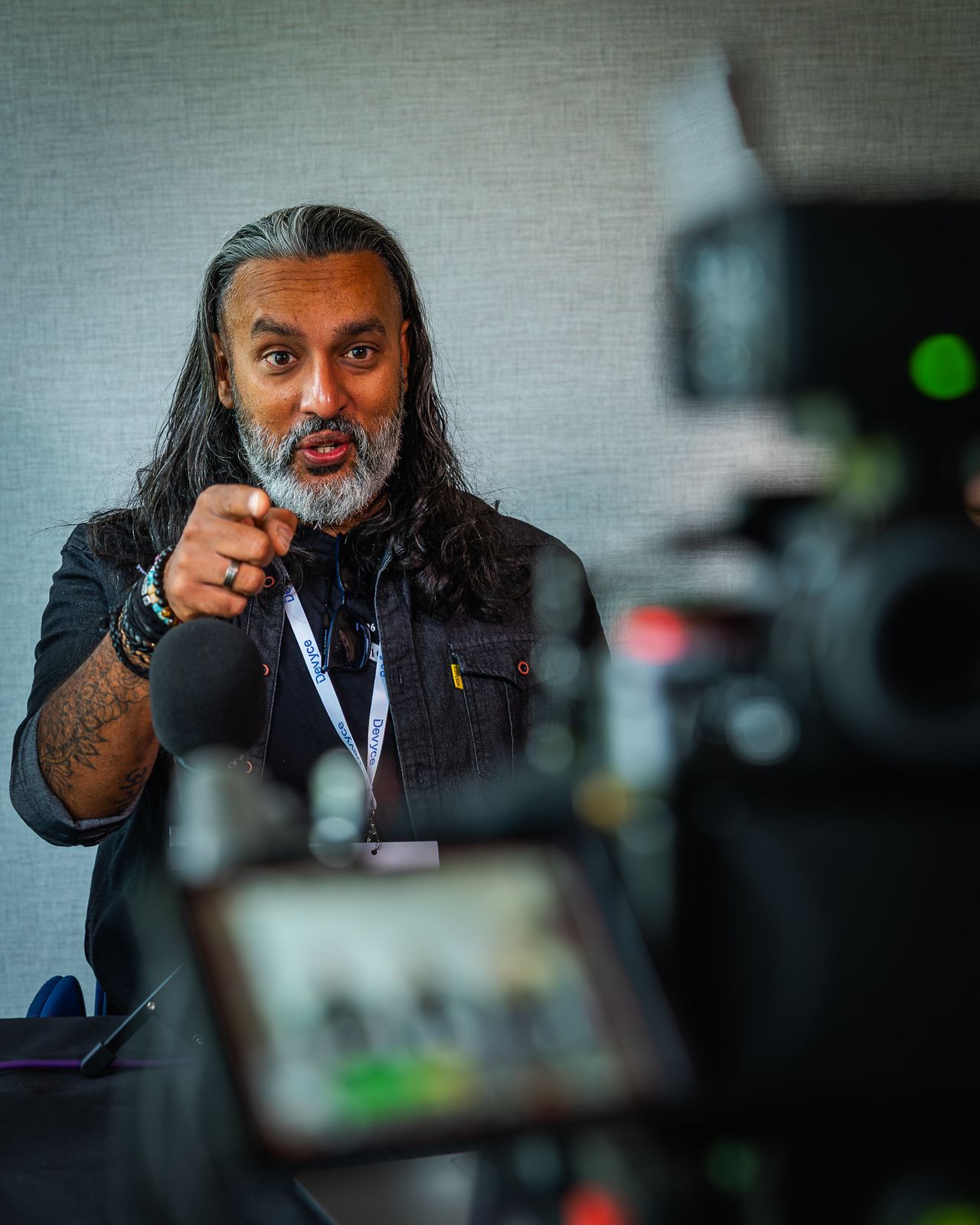 Podcast host speaking to camera